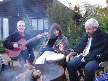 music, singing, fire, blankets and marshmallows in the evening